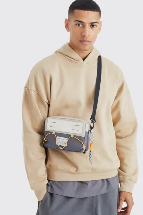 Nylon Cross Body Bag With Bungee Cord | boohooMAN UK